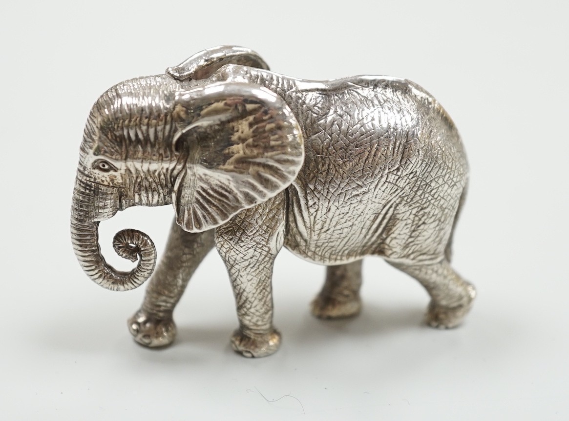 A modern Patrick Mavros miniature 925 model of an elephant, stamped 'Hasha', length 62mm, 219 grams.